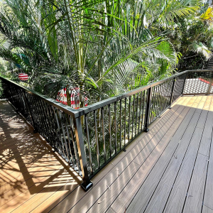 Angled top view of a balcony deck with the Peak Aluminium Balustrade system in black installed.
