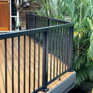 Peak Aluminium Balustrade system with standard balusters installed on a light wood deck.